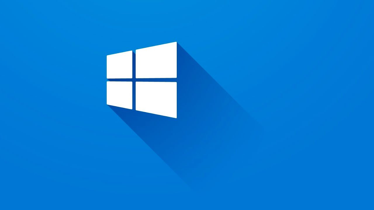 Alt text (in Italian): Logo di Windows su sfondo blu, simbolo del sistema operativo storico.