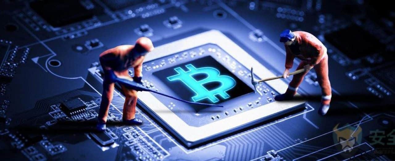 Alt text (in Italian):Mining e criptovalute: operai simbolici lavorano su chip Bitcoin